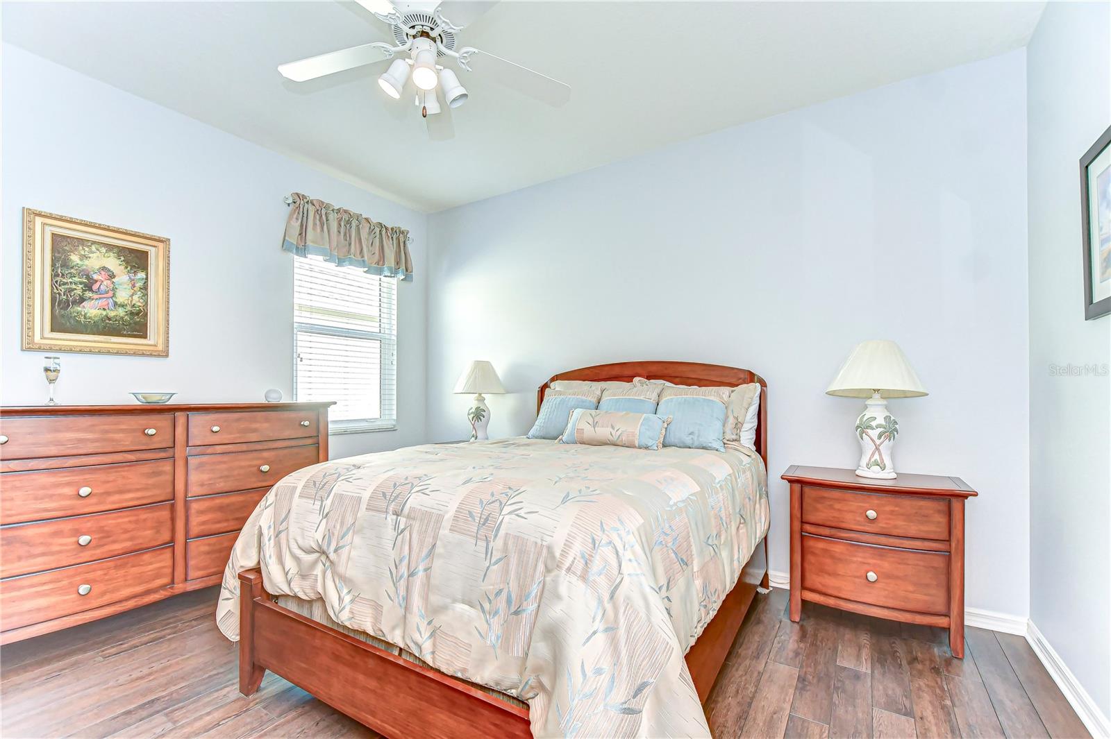 Slip into serene comfort in this charming third bedroom.