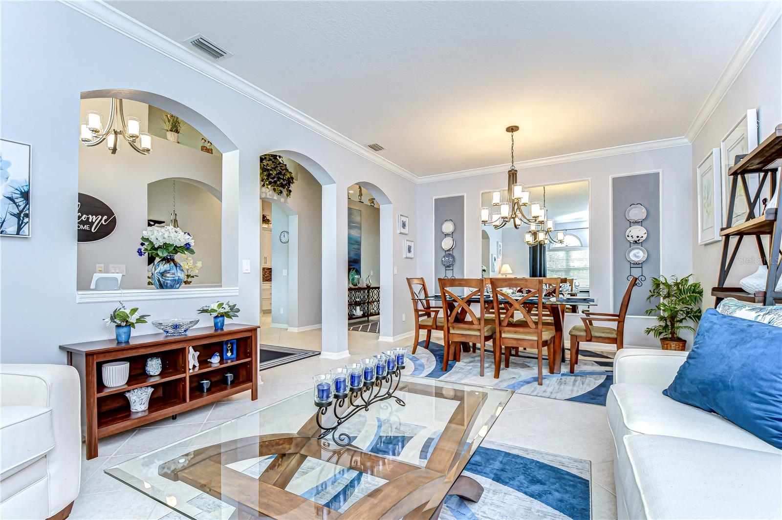 The open layout and graceful arches add charm and sophistication.