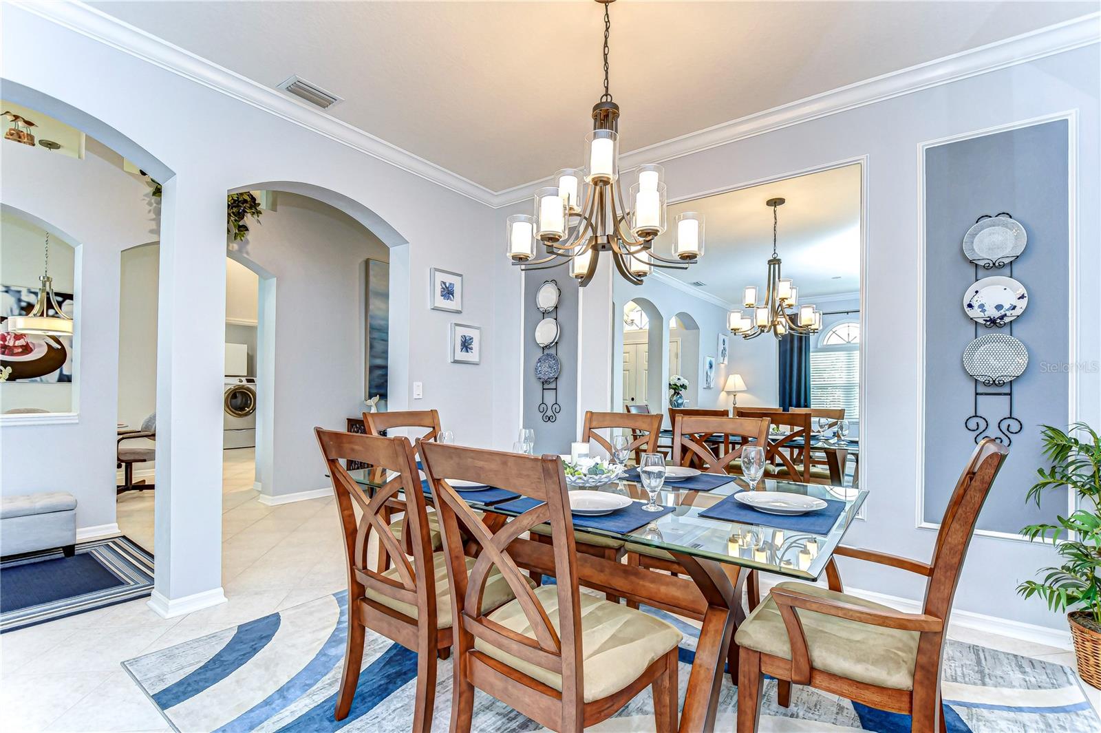 This dining room boasts a sophisticated setting perfect for both intimate dinners and lively gatherings.