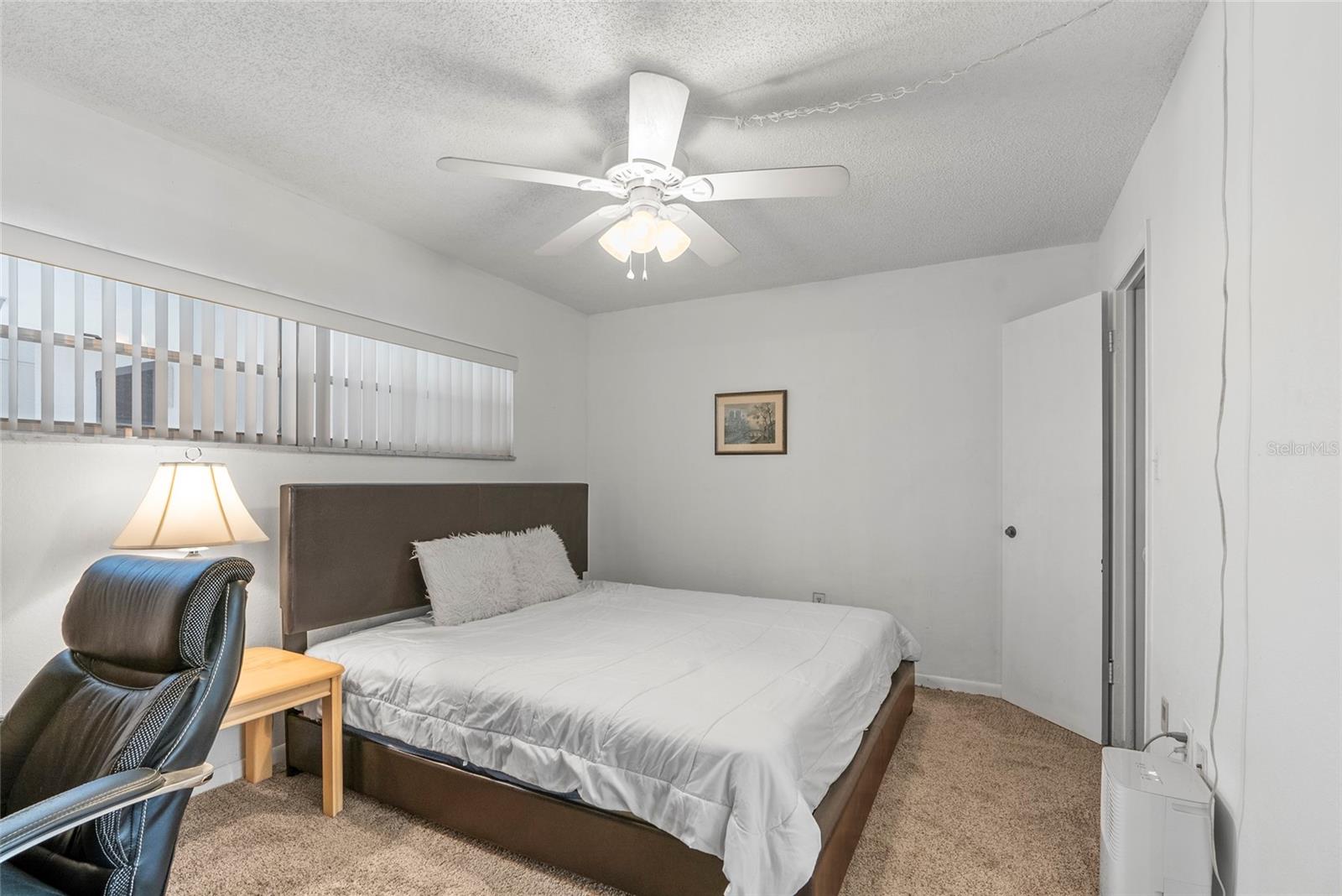 Primary bedroom with walk in closet.