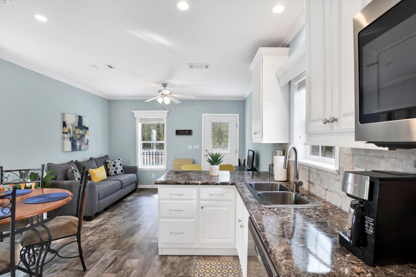 Spacious kitchen view towards the front porch.