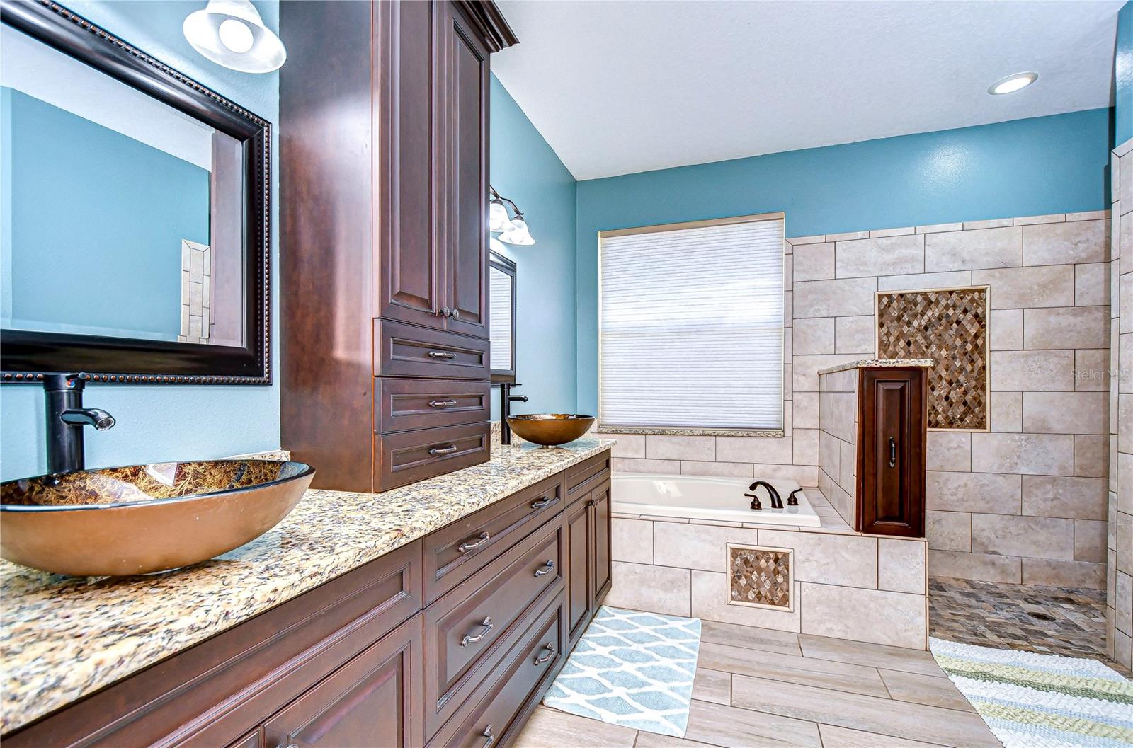 Expansive shower and soaking tub offer the pinnacle of luxury!