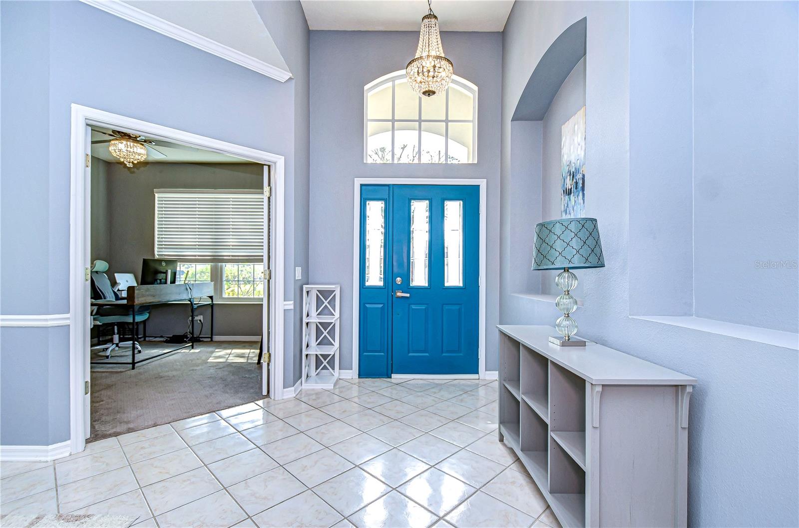 Step into elegance with this bright foyer.