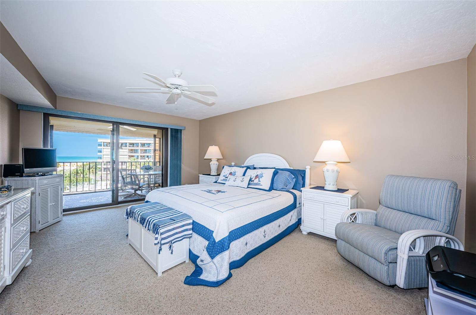 Master bedroom is quite large, and has a slider to the Gulf-side balcony