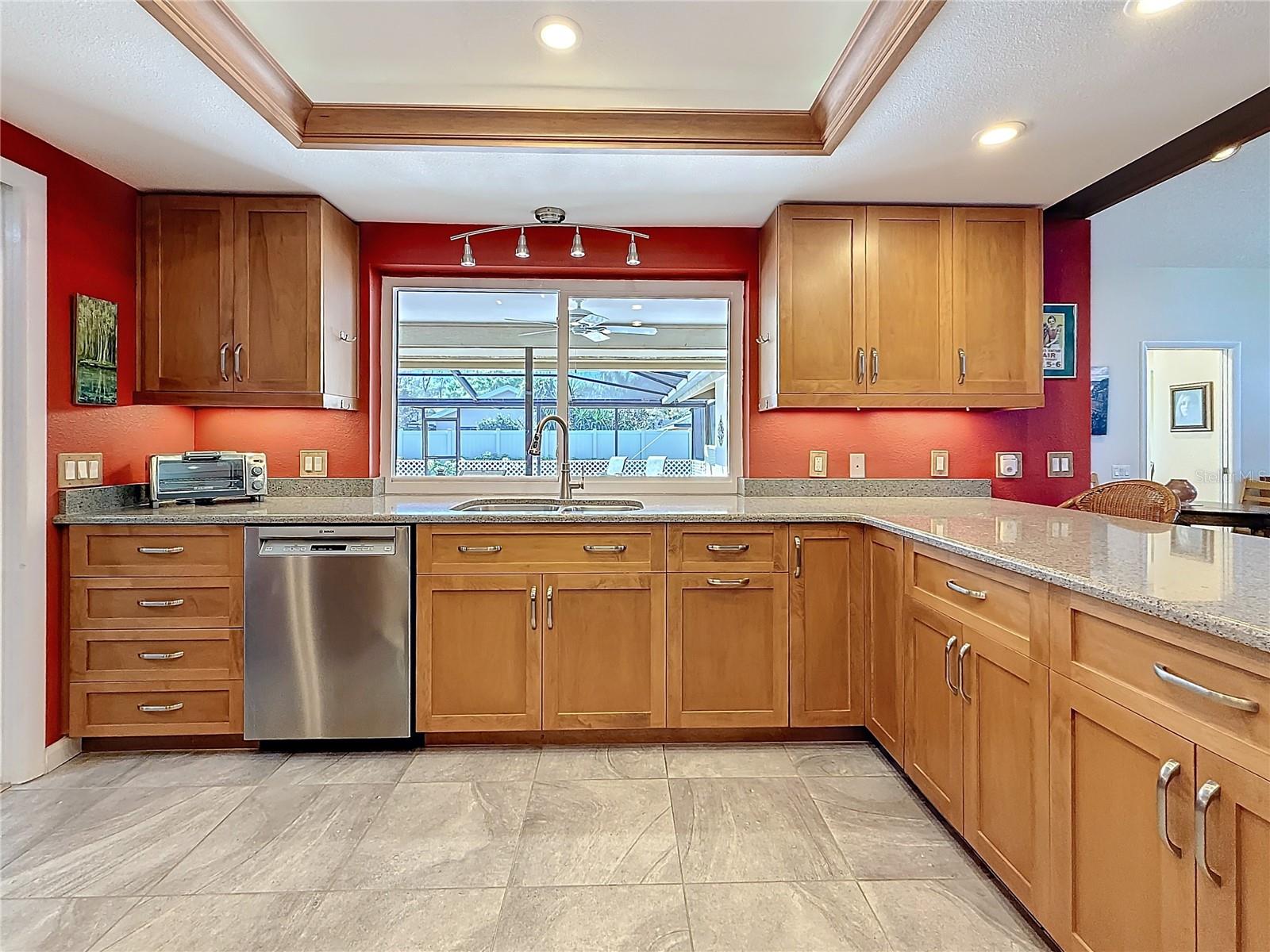 Kitchen window with pass through to the pool area