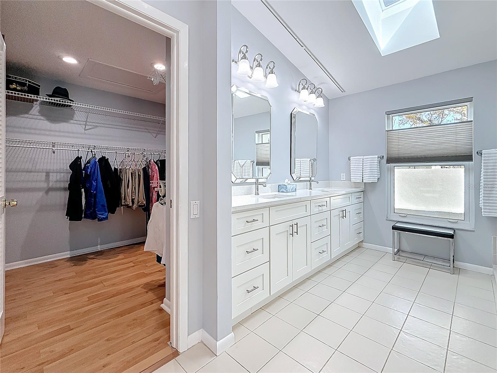 Skylight in the primary bath brings in lots of natural light