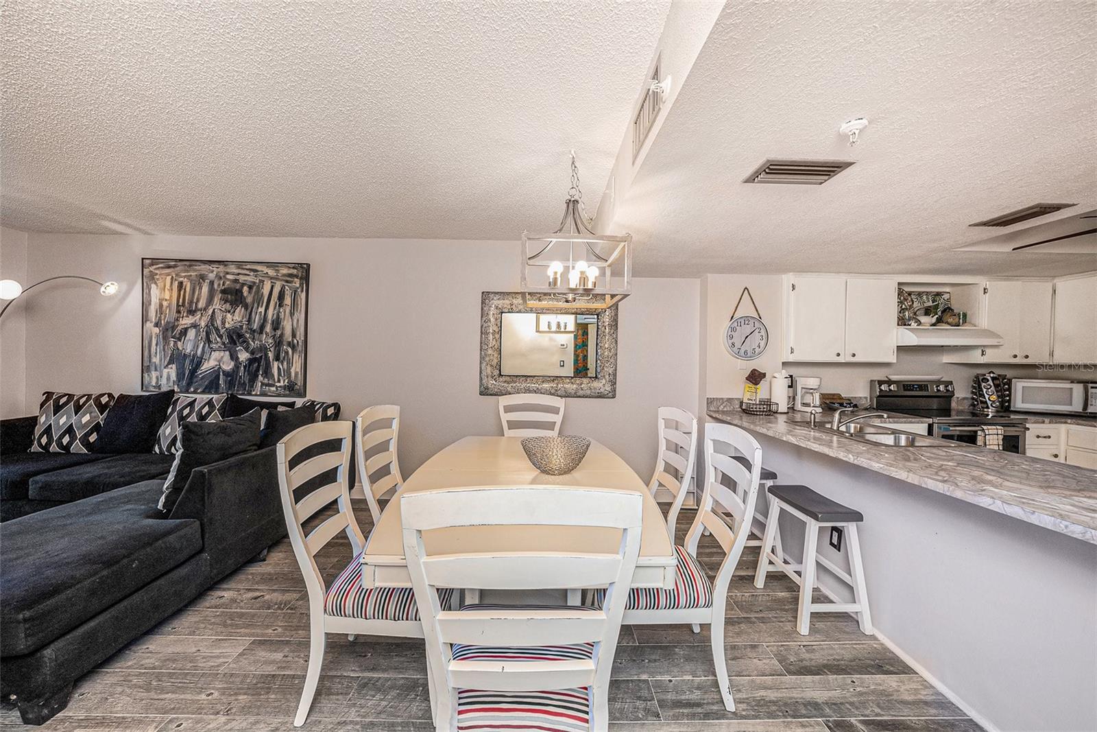 12924 Gulf Blvd #110, Madeira Beach FL 33708 - Sandy Shores Unit 110 Dining/Living Room