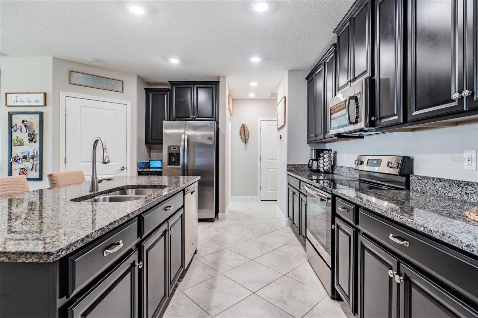 Plenty of cabinets and walk-in pantry