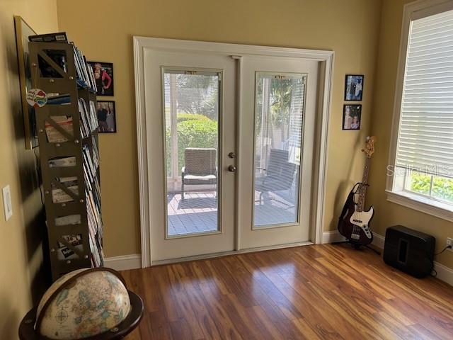 Study off Family Room with French doors leading to private back porch.