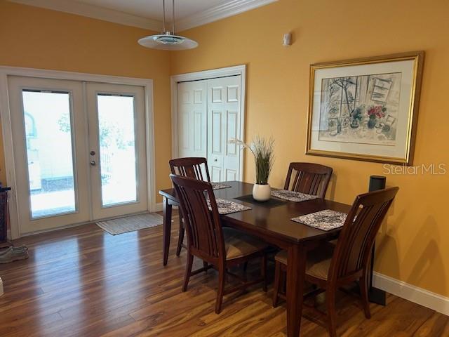 Dining area with walk-in storage closet.