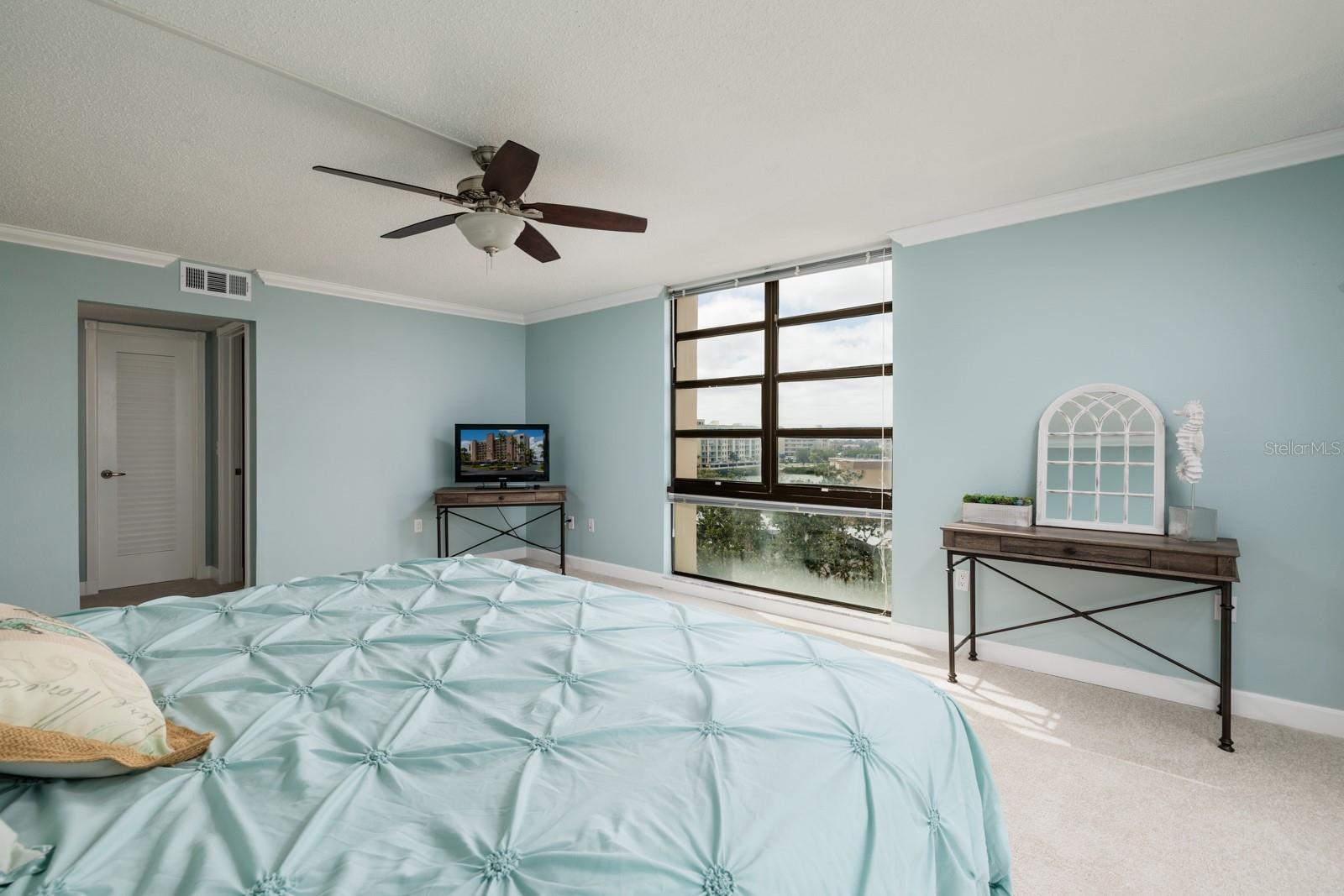 Oversized master suite with floor to ceiling windows providing spectacular views of Boca Ciega Bay, the intracoastal, peek a boo views of the Gulf & more!