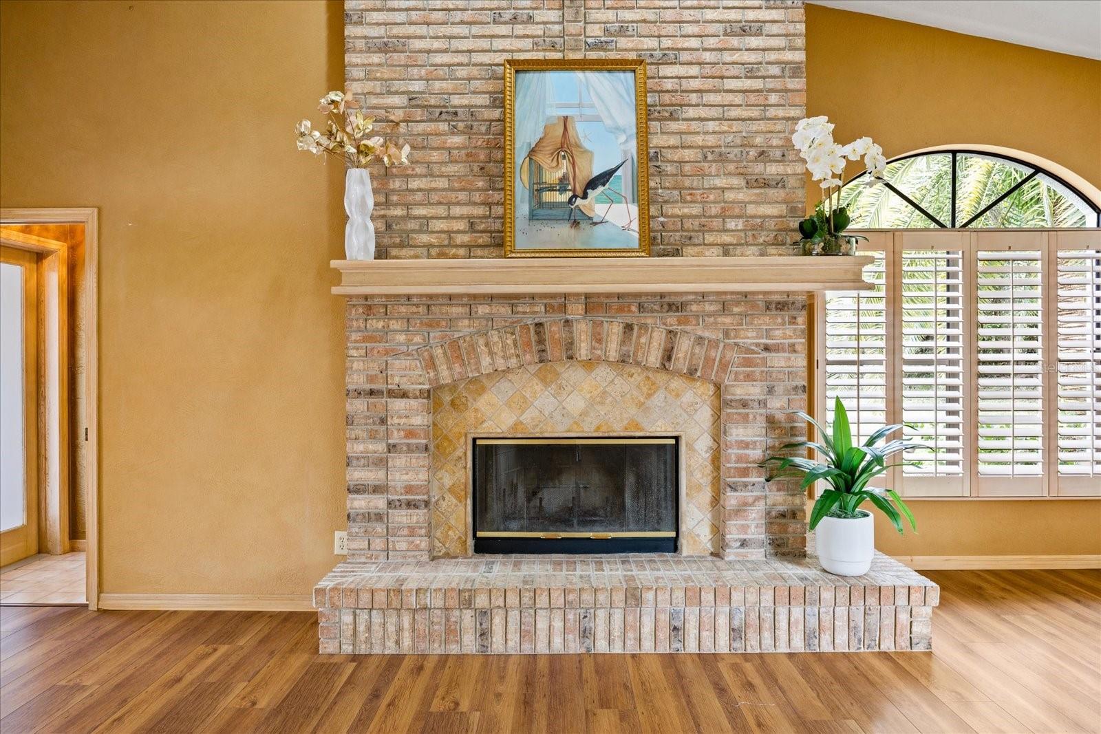 Lovely Woodburning Brick Fireplace