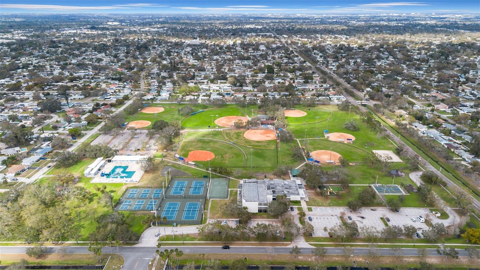 Northwest Park minutes away with pickleball, tennis courts, pool, baseball and more!