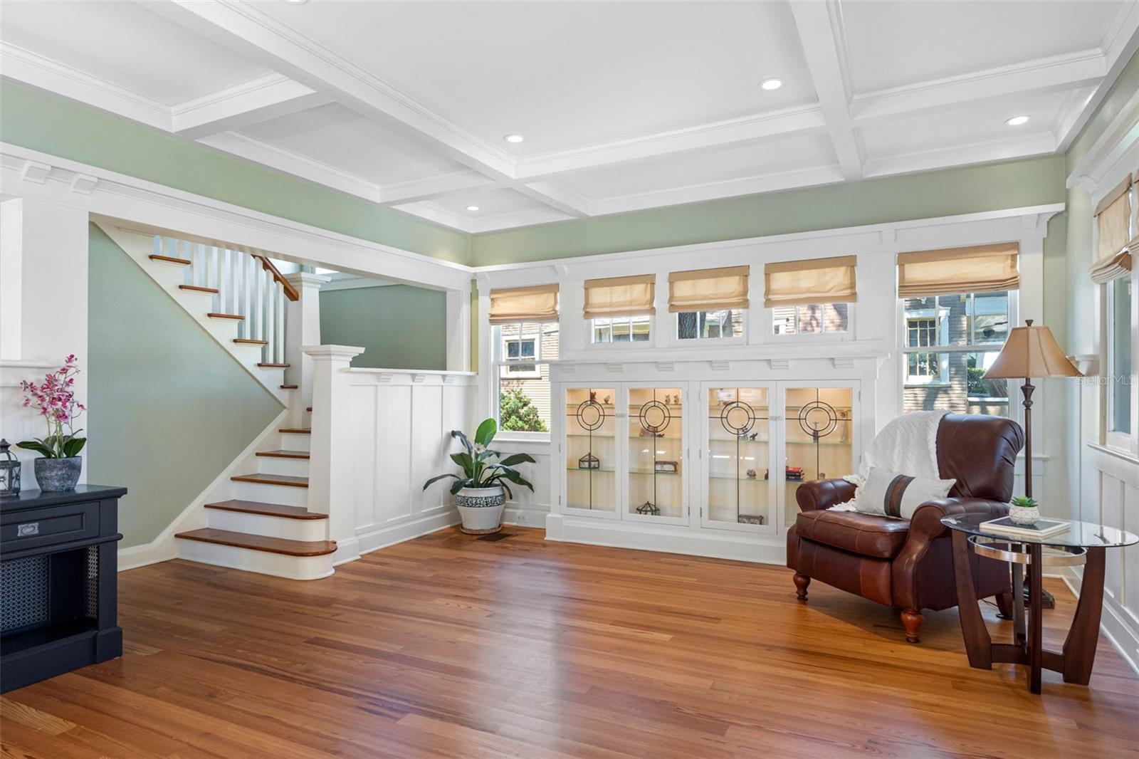 Living room, filled with natural light.