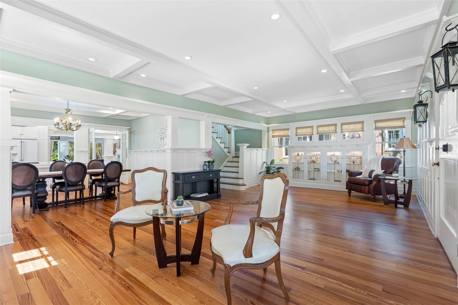 Living room followed by a large dining room.