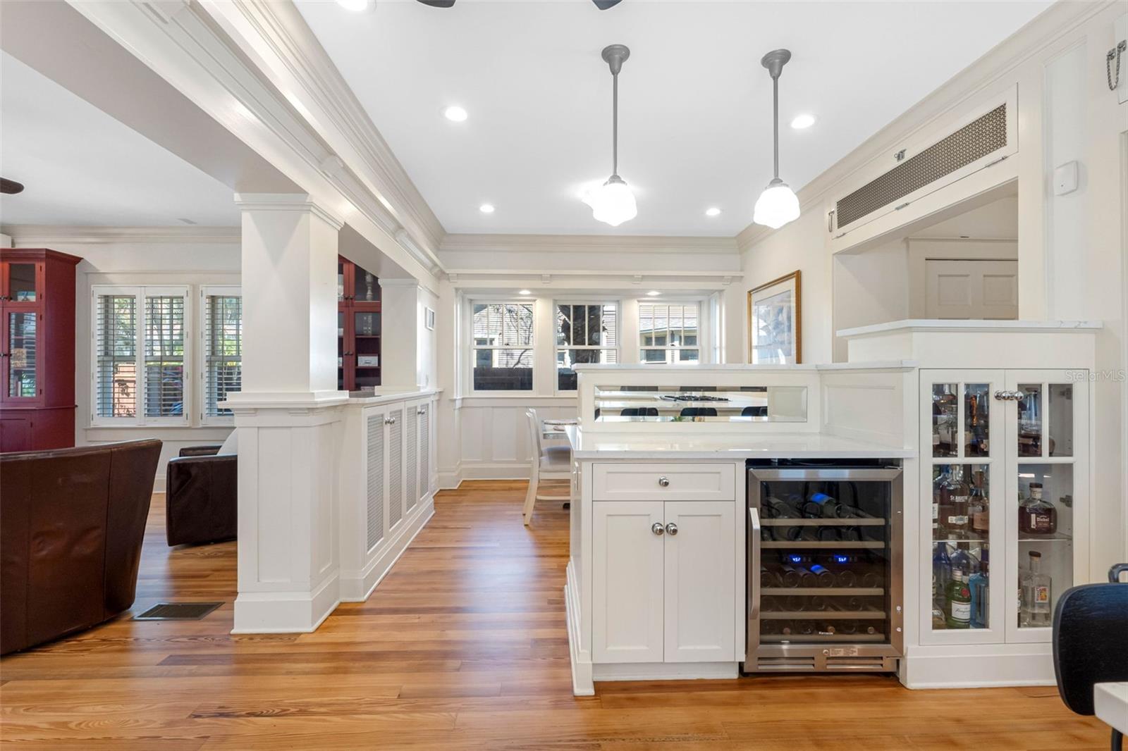 Eat-in breakfast area view from the kitchen. Wine refrigerator and liquor cabinet