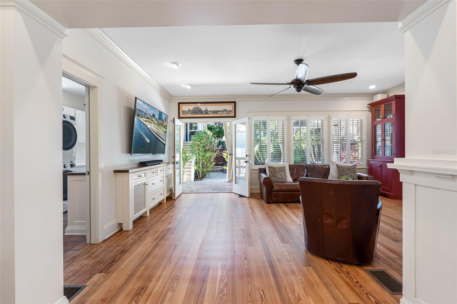 Family room with french doors that lead to the back lanai.