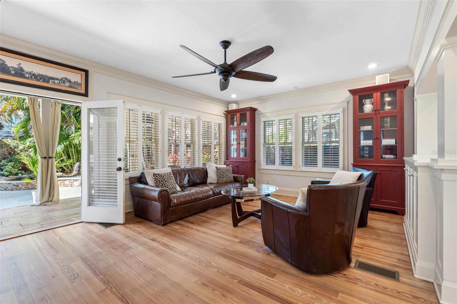 Family room with french doors that lead to the back lanai.