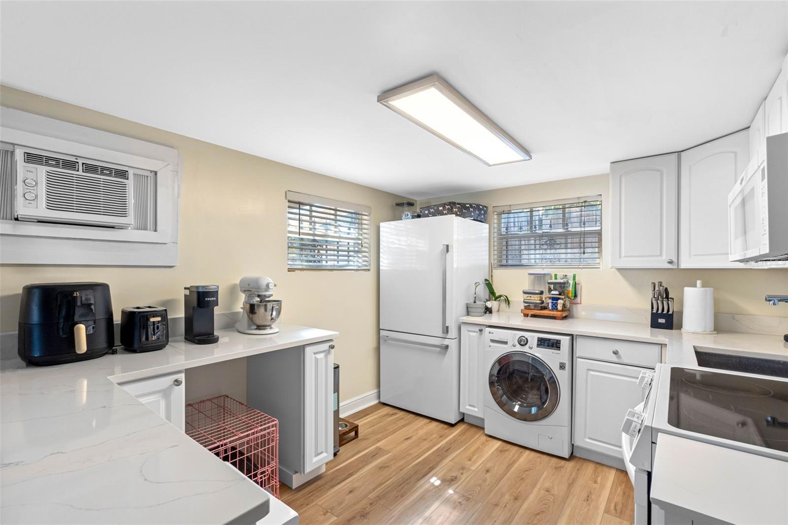 First floor unit of carriage home. It has two bedrooms and one bath. It features new flooring, updated kitchen with new appliances, and updated bathroom.