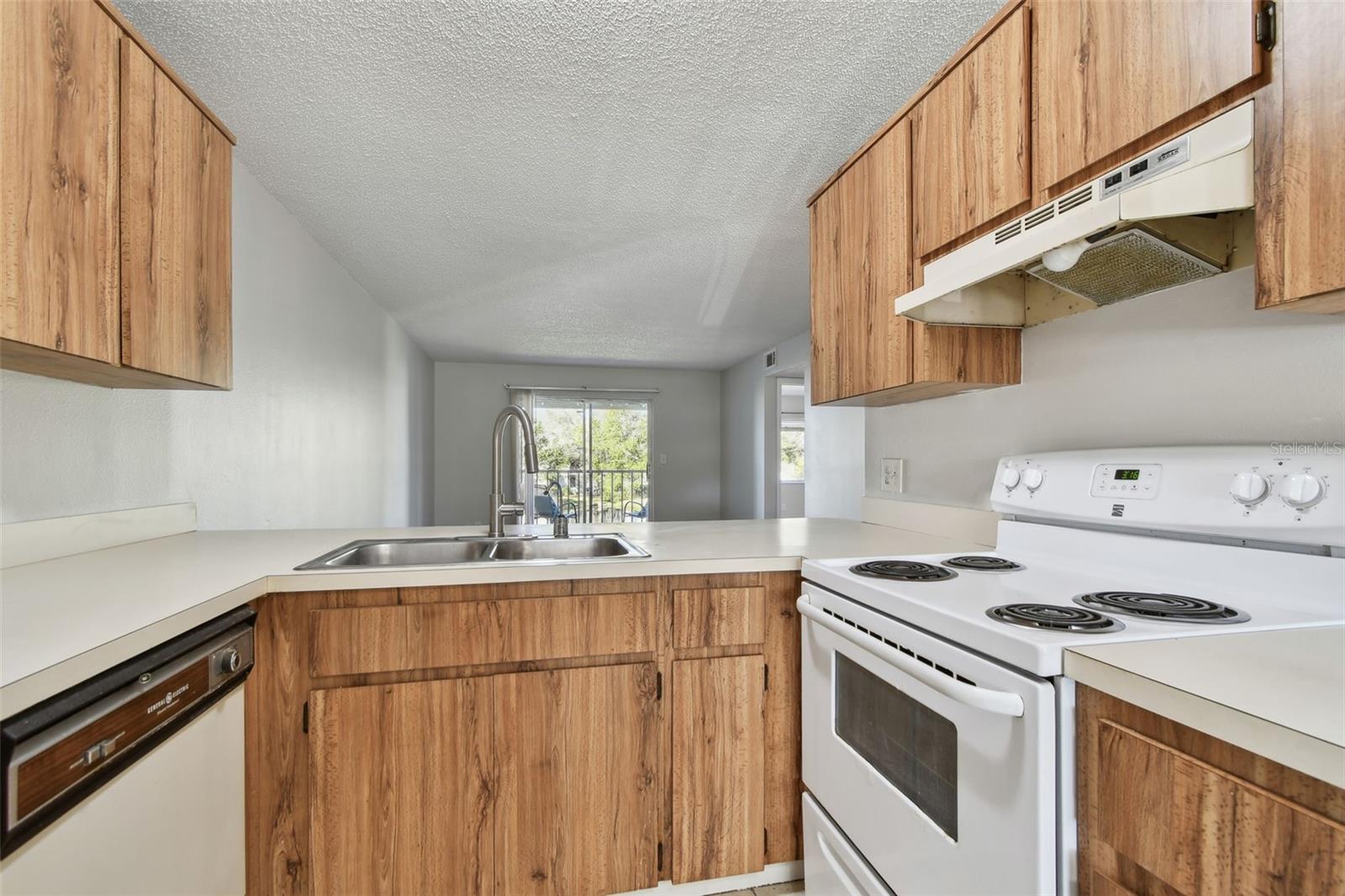 open view to the living room space and balcony