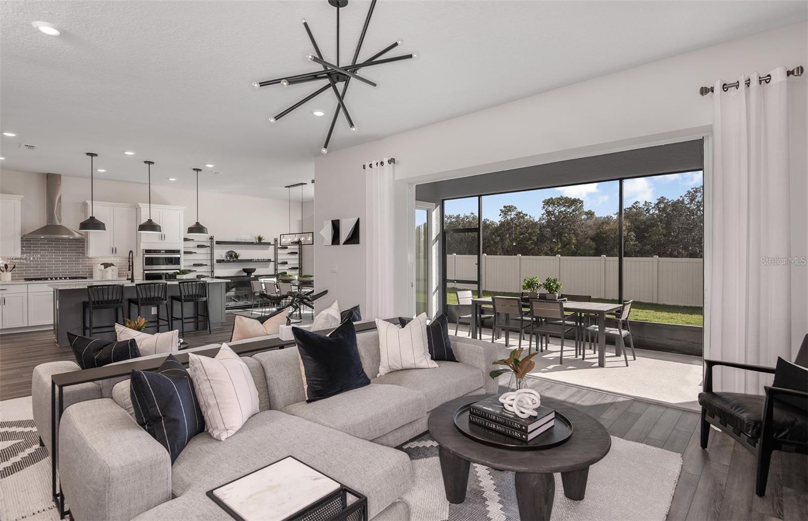 Model representation of living area, kitchen, dining and lanai