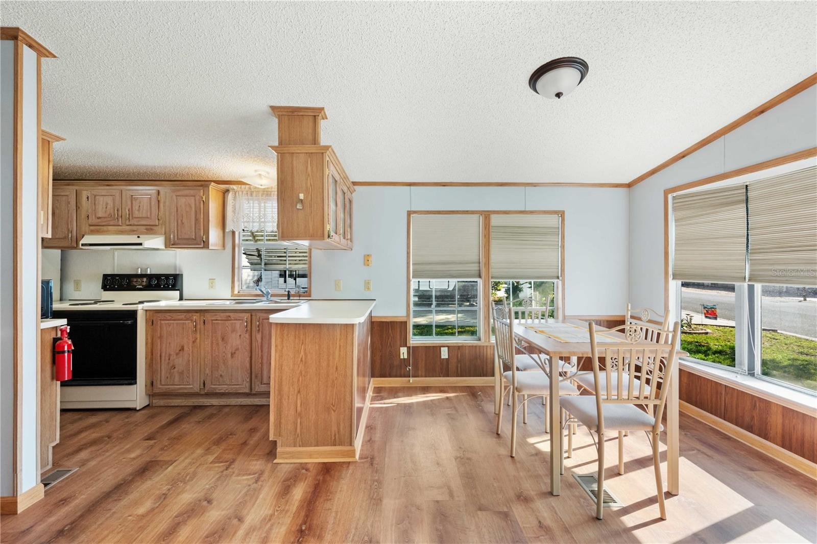 Open concept dining and kitchen area.