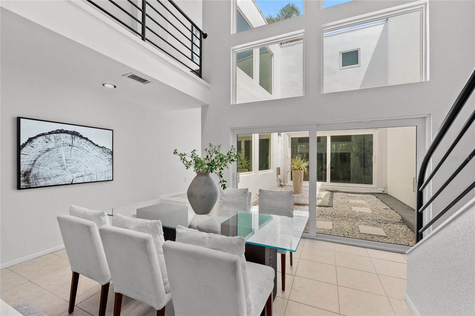 Dining area looking into the 2-story atrium.