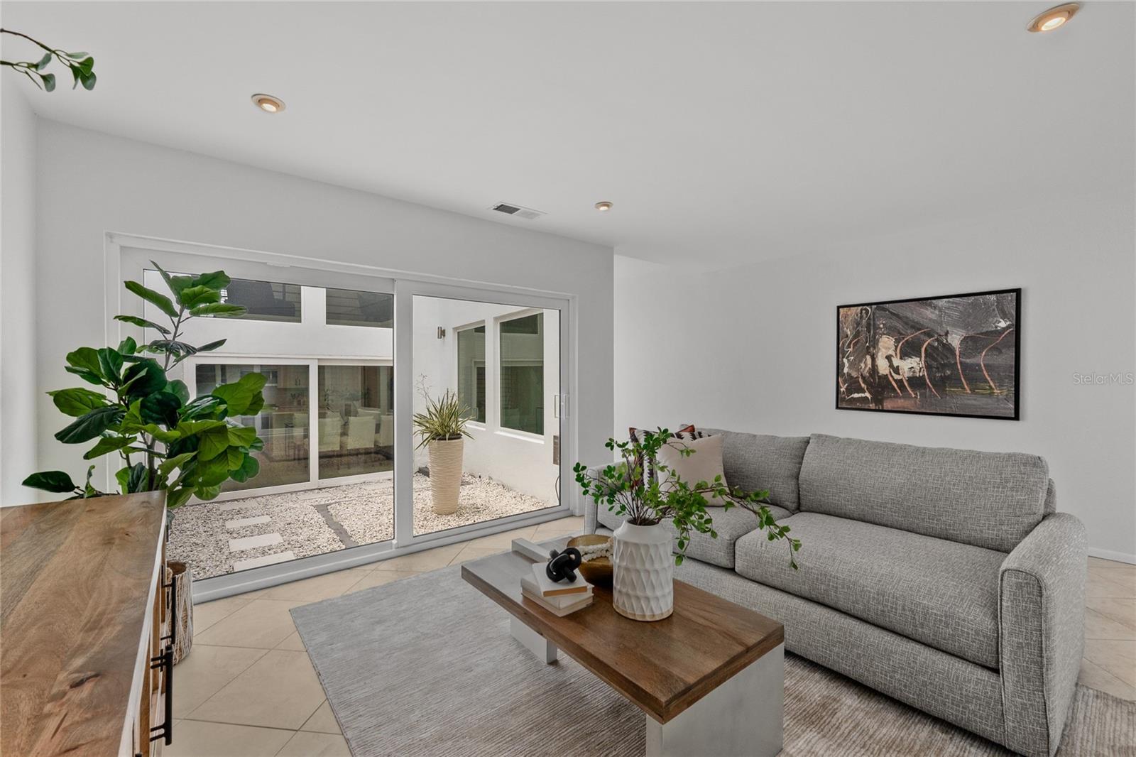 Living Room - great view into atrium.