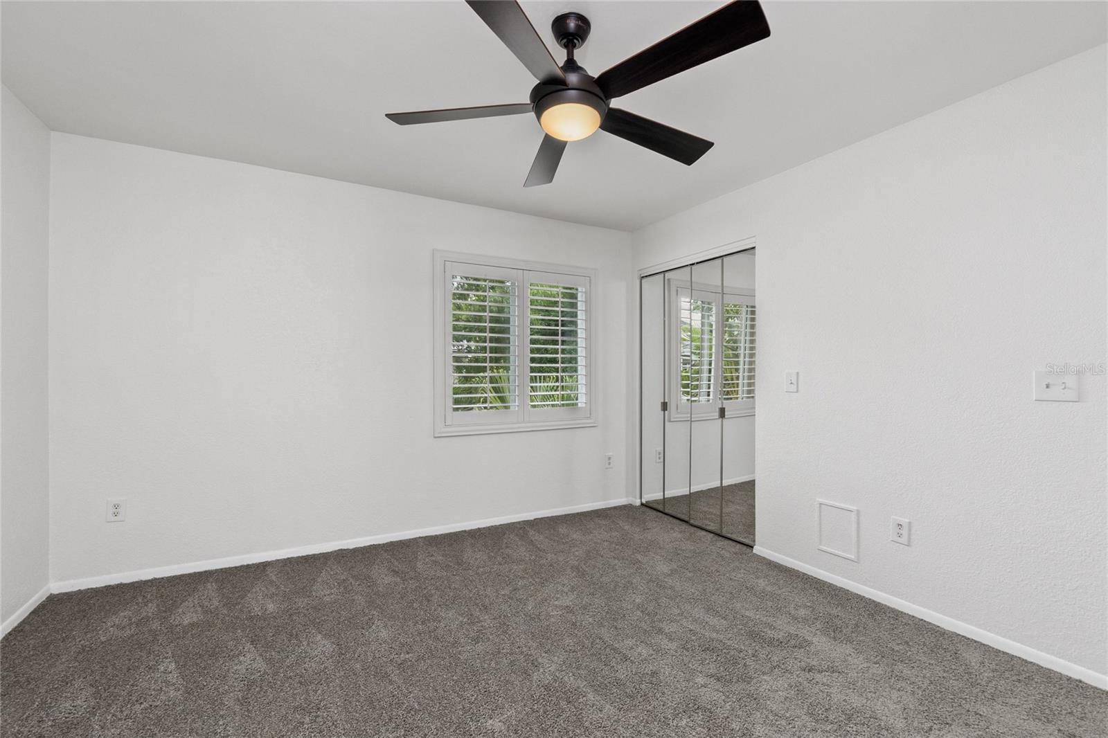 2nd Bedroom/guest bedroom with walk-in closet.