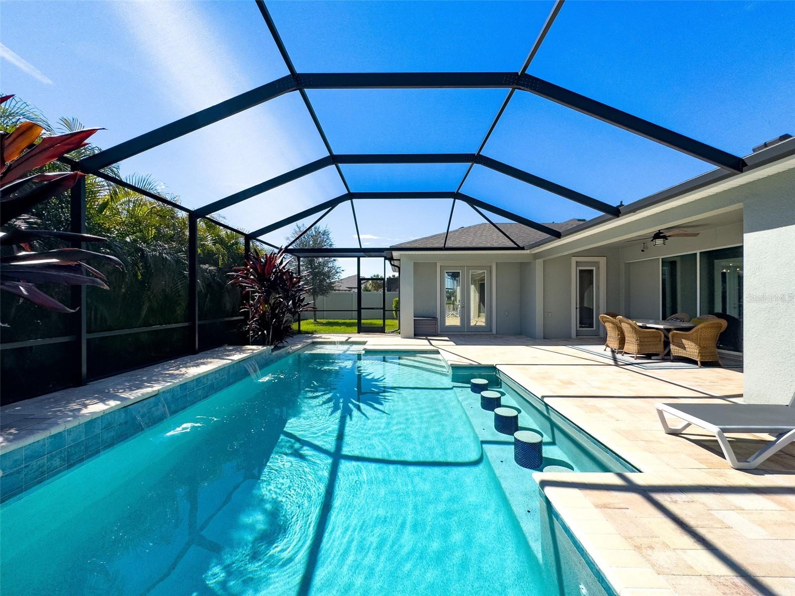 Check out the stools in the custom pool