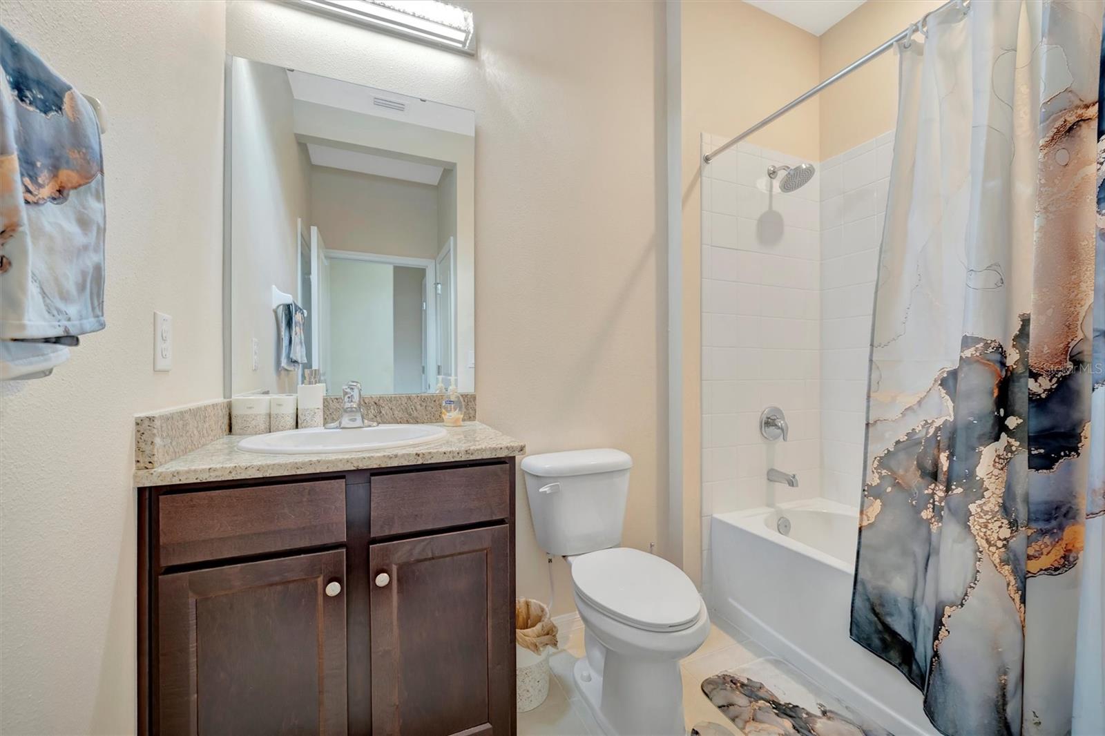 The second bathroom that is shared by the other two guest bedrooms