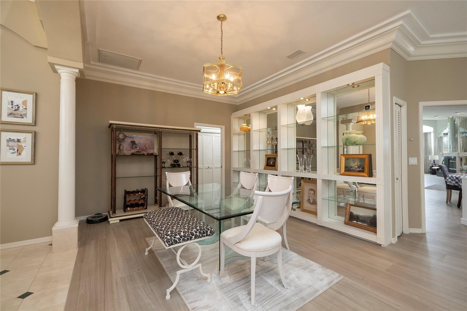 Formal Dining with lighted built in cabinet