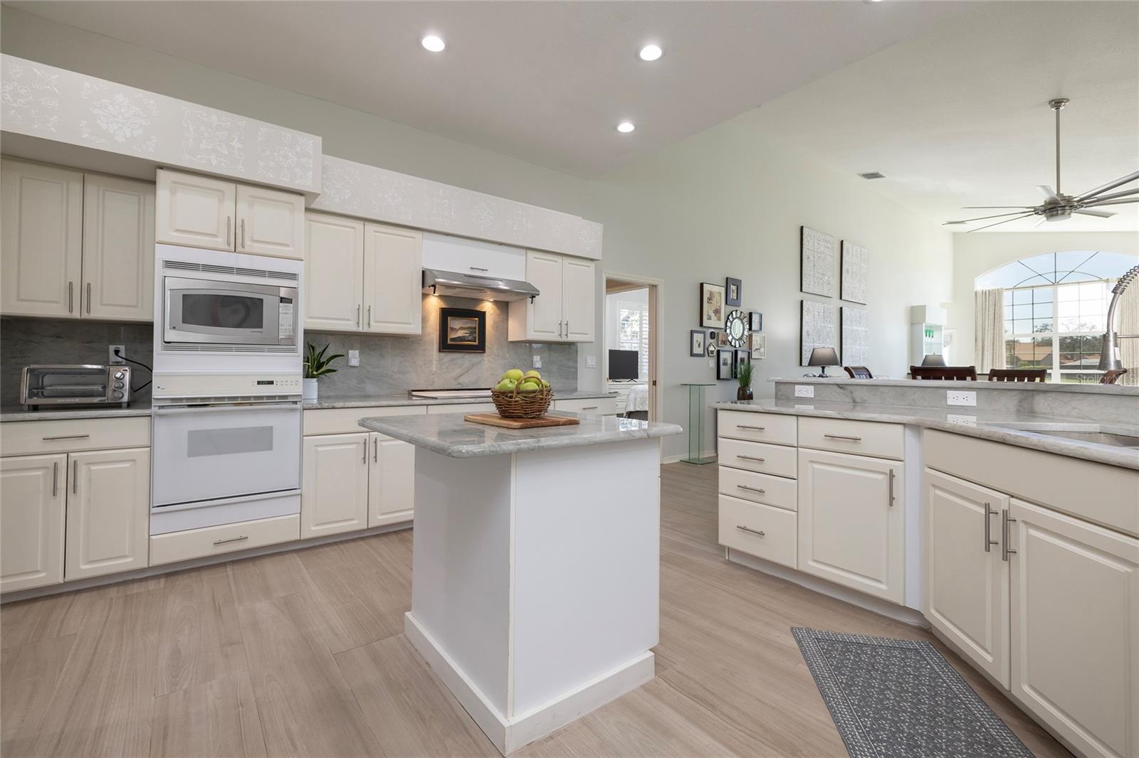 Gourmet kitchen with island and breakfast bar