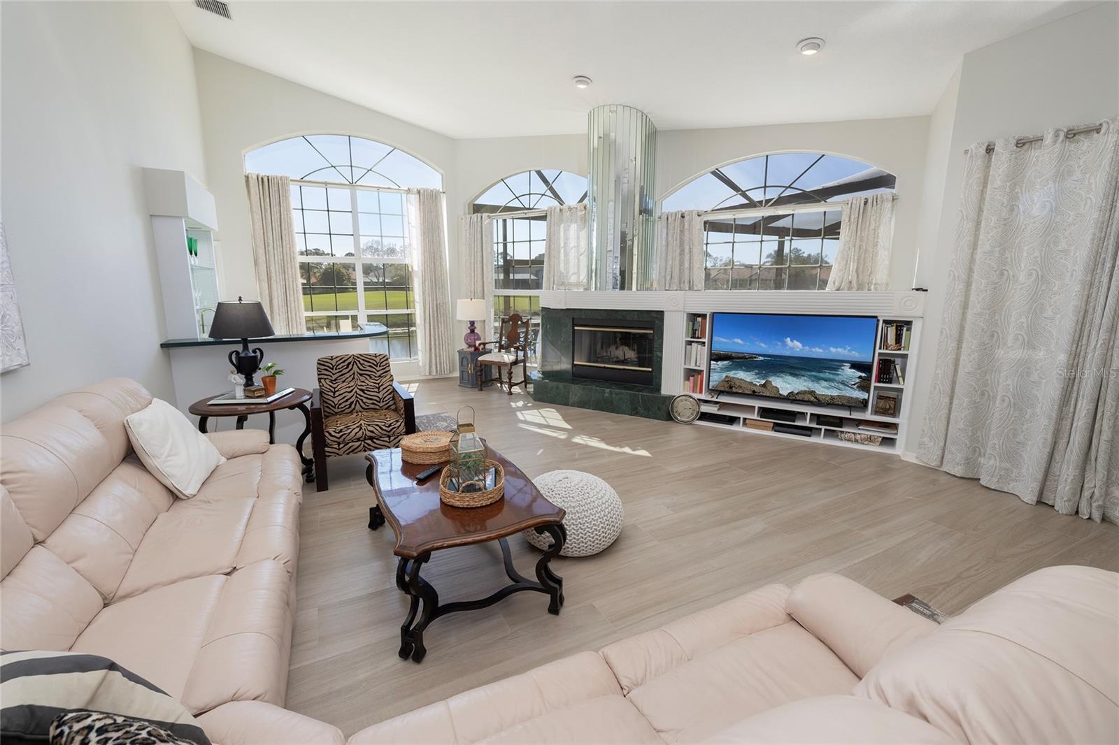 Gathering room with wood burning fireplace