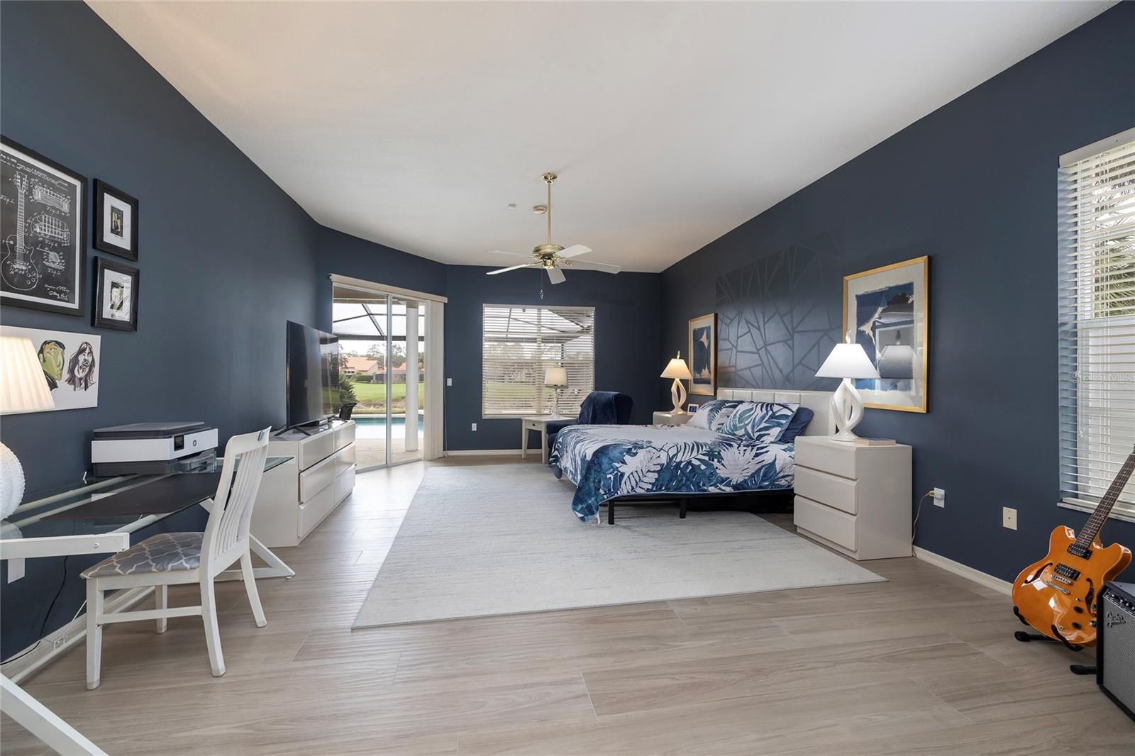 Primary Bedroom with sitting space by the pool access