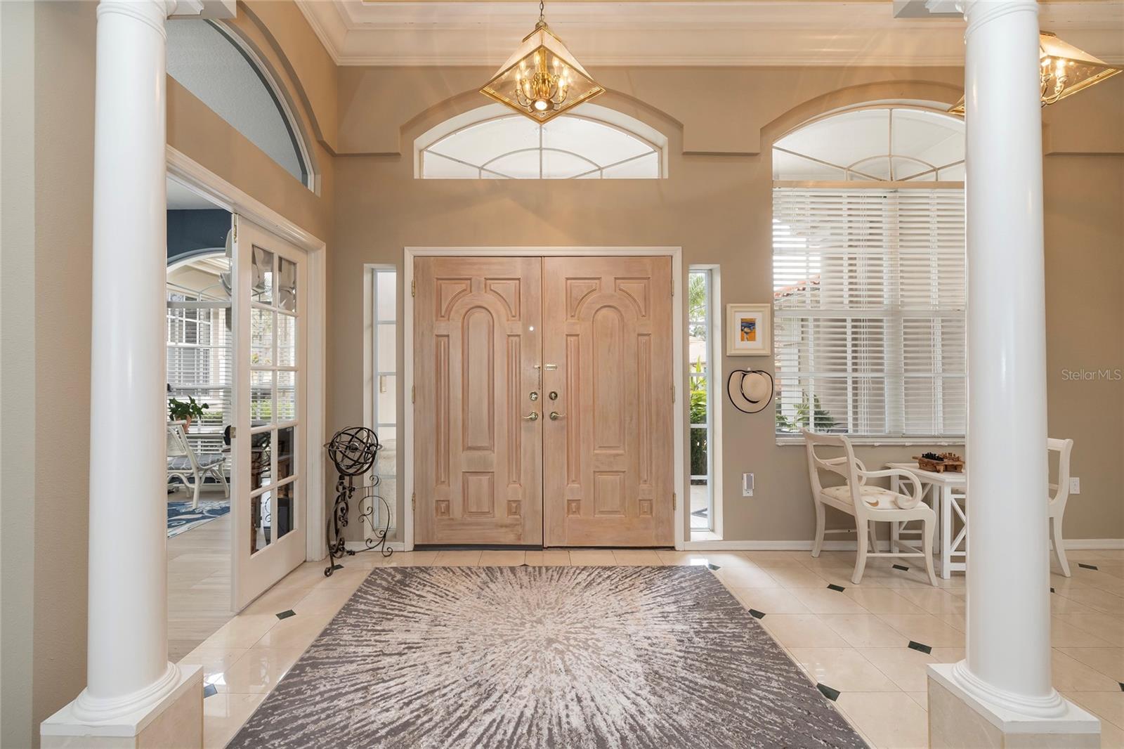 Foyer with marble flooring