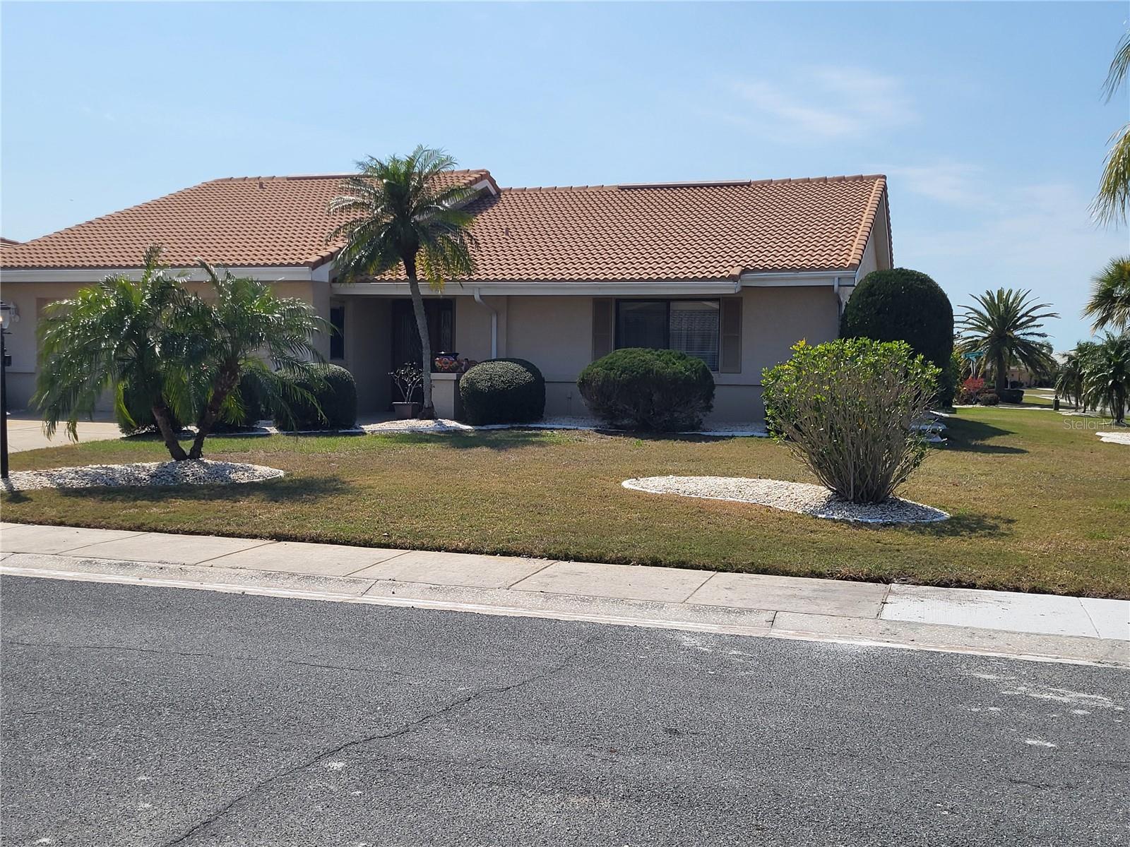 Stunning curb appeal!Beautiful, corner lot, Ranch Style home with a tile roof, in highly desired Greenbriar neighborhood.