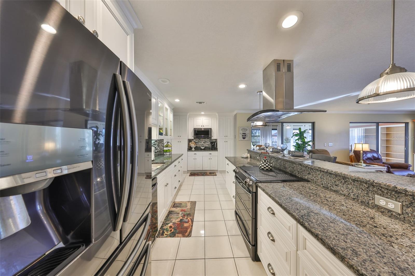 Large enough for multiple cooks and stainless steel appliances to compliment the look.