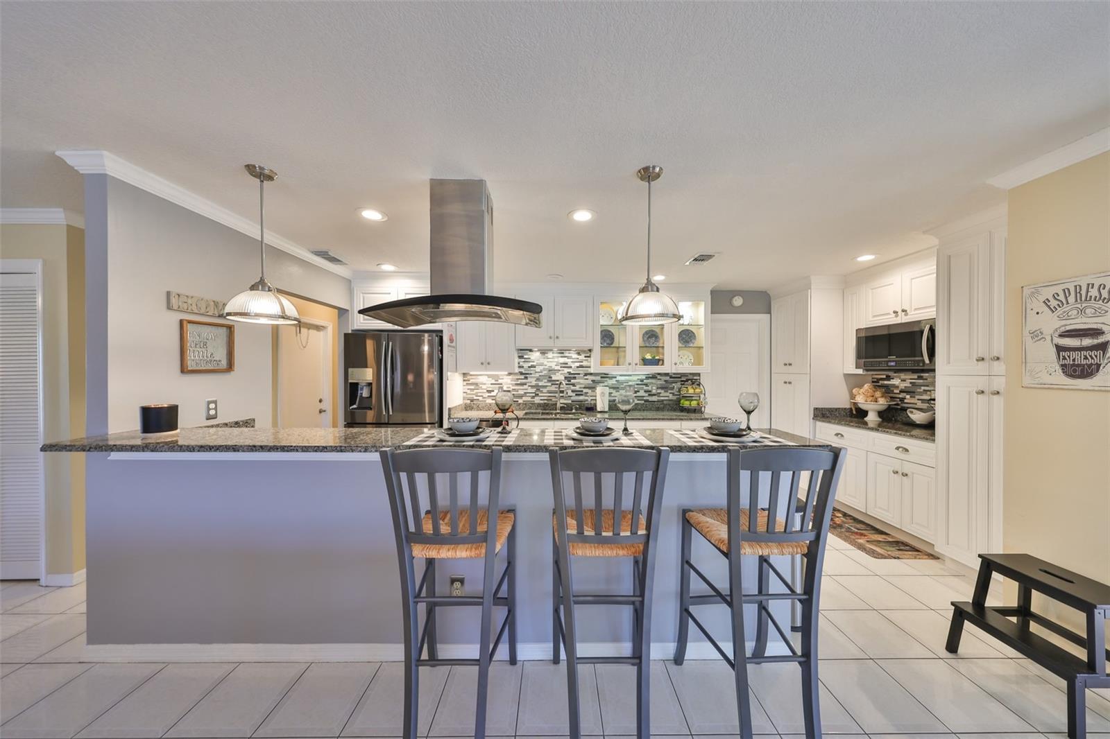 A large breakfast bar compliments the whole room.