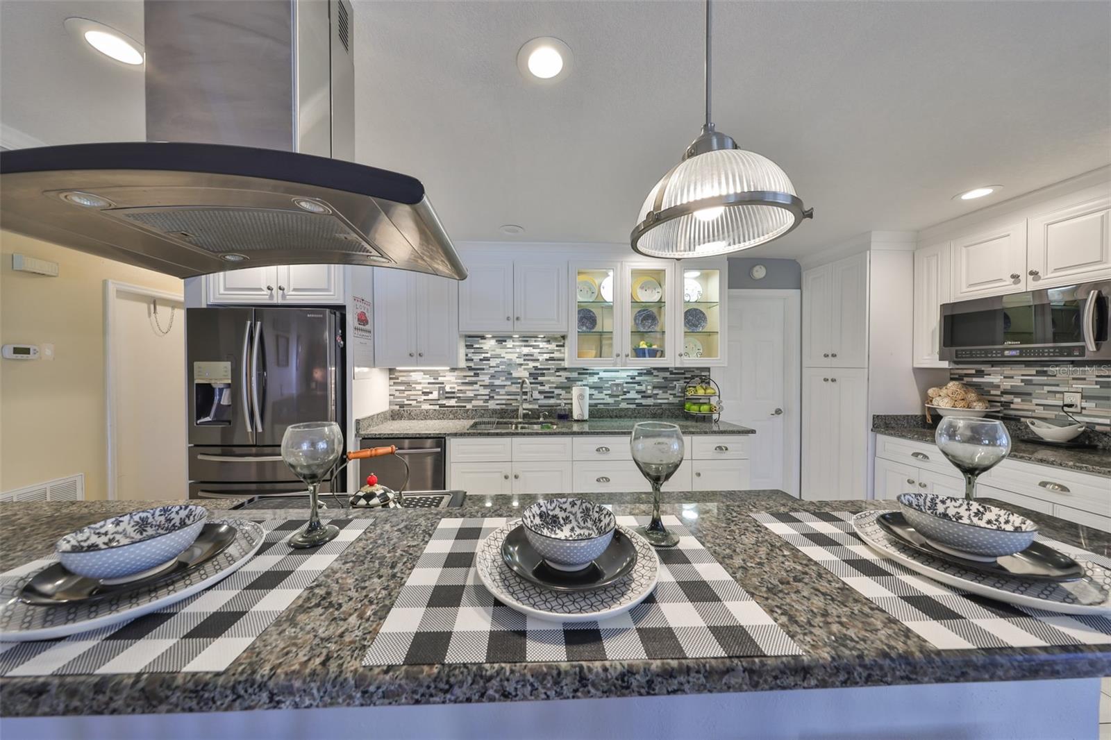 Beautiful, modern granite accents the kitchen.