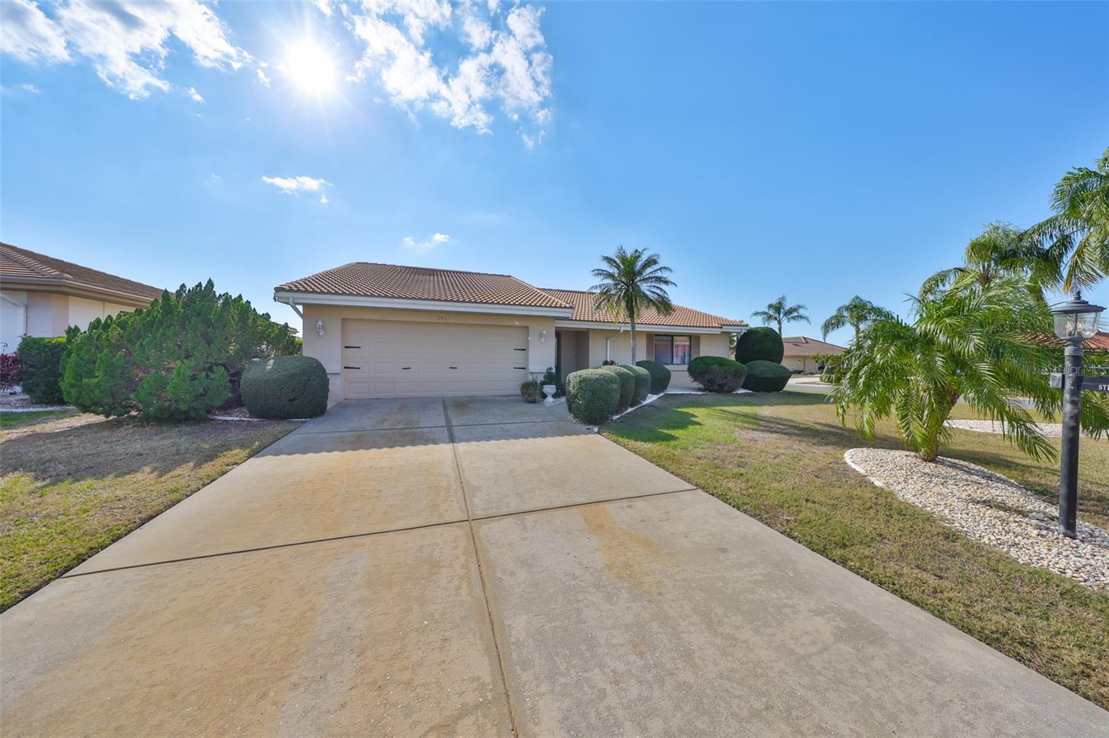 Tile roof and deep driveway are just a few of the features of this home.