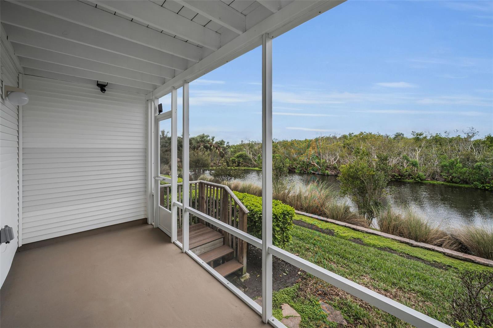 Lower level screen enclosed patio