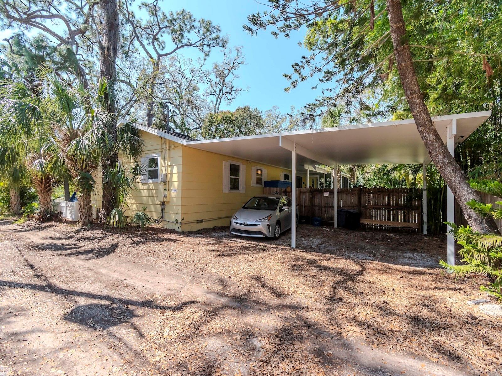 ATTACHED CARPORT HOLDS 2 CARS