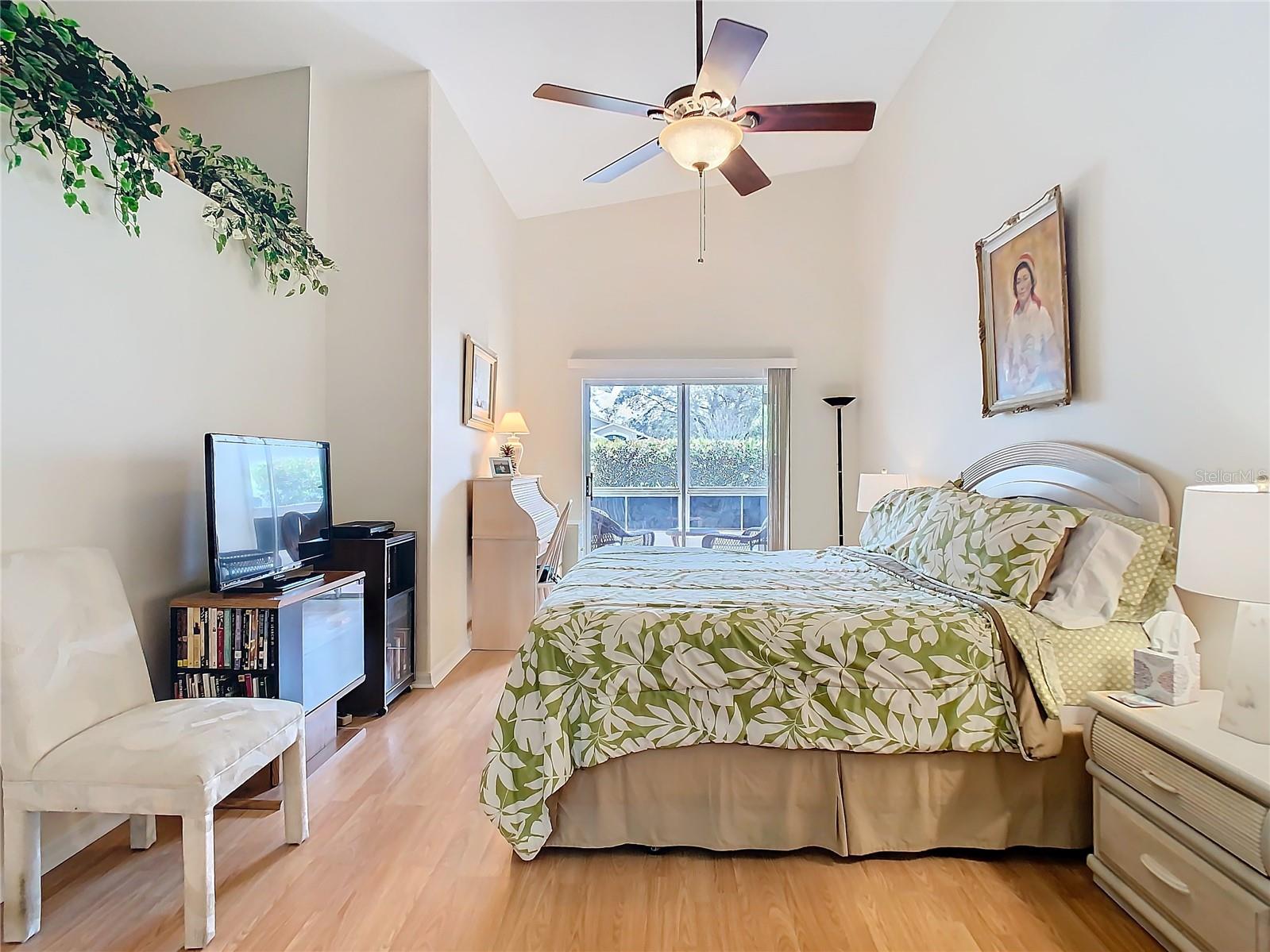 The primary bedroom is quite spacious (14'x26'). High ceilings also give it that big feel to it. You have a sliding door out onto  your private patio area.