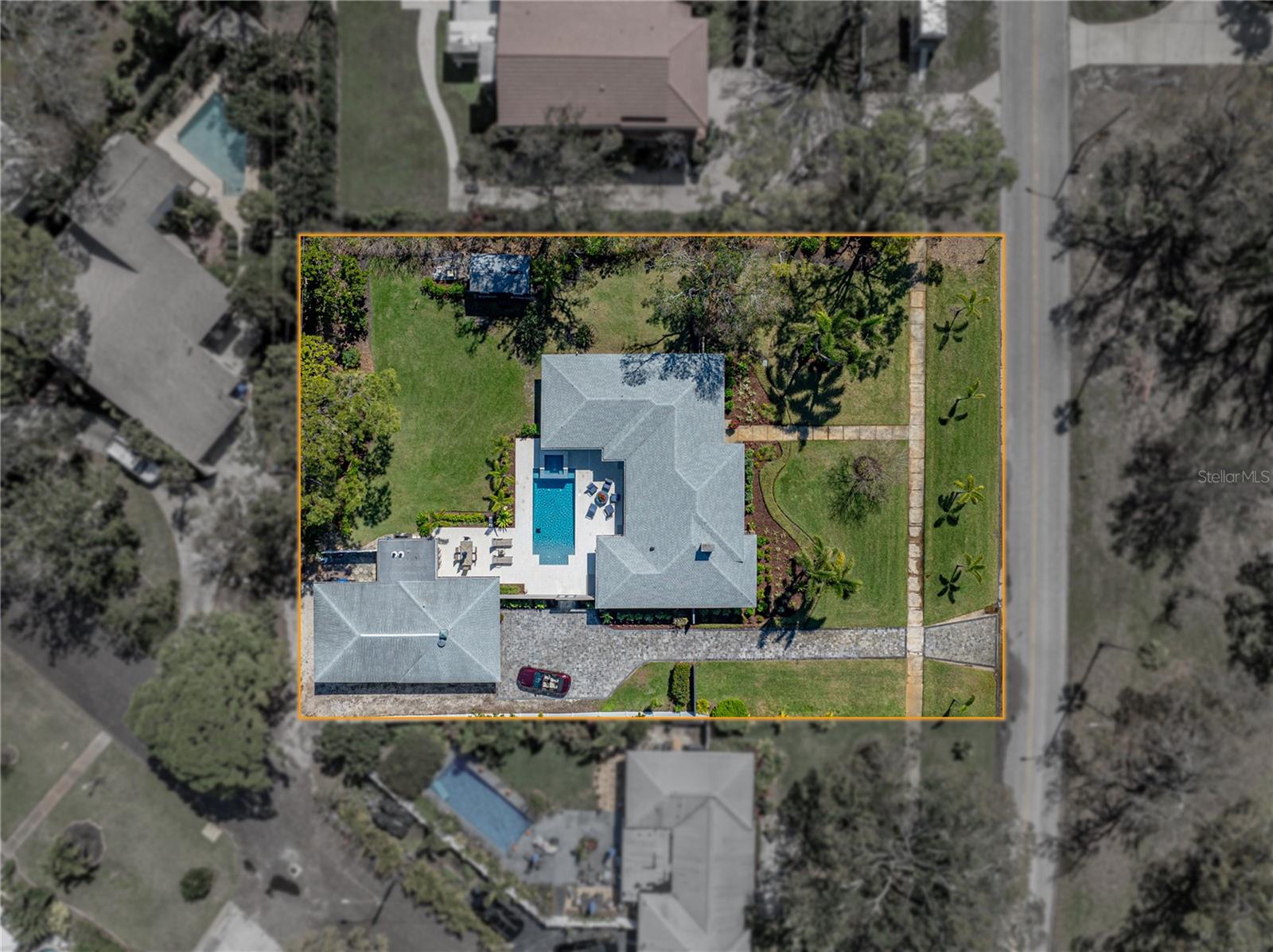 Enjoy an enormous oversized double lot - .57 acres. 141x175, with a pull-through driveway that runs the length of the property, from Park Street to the rear alley access.