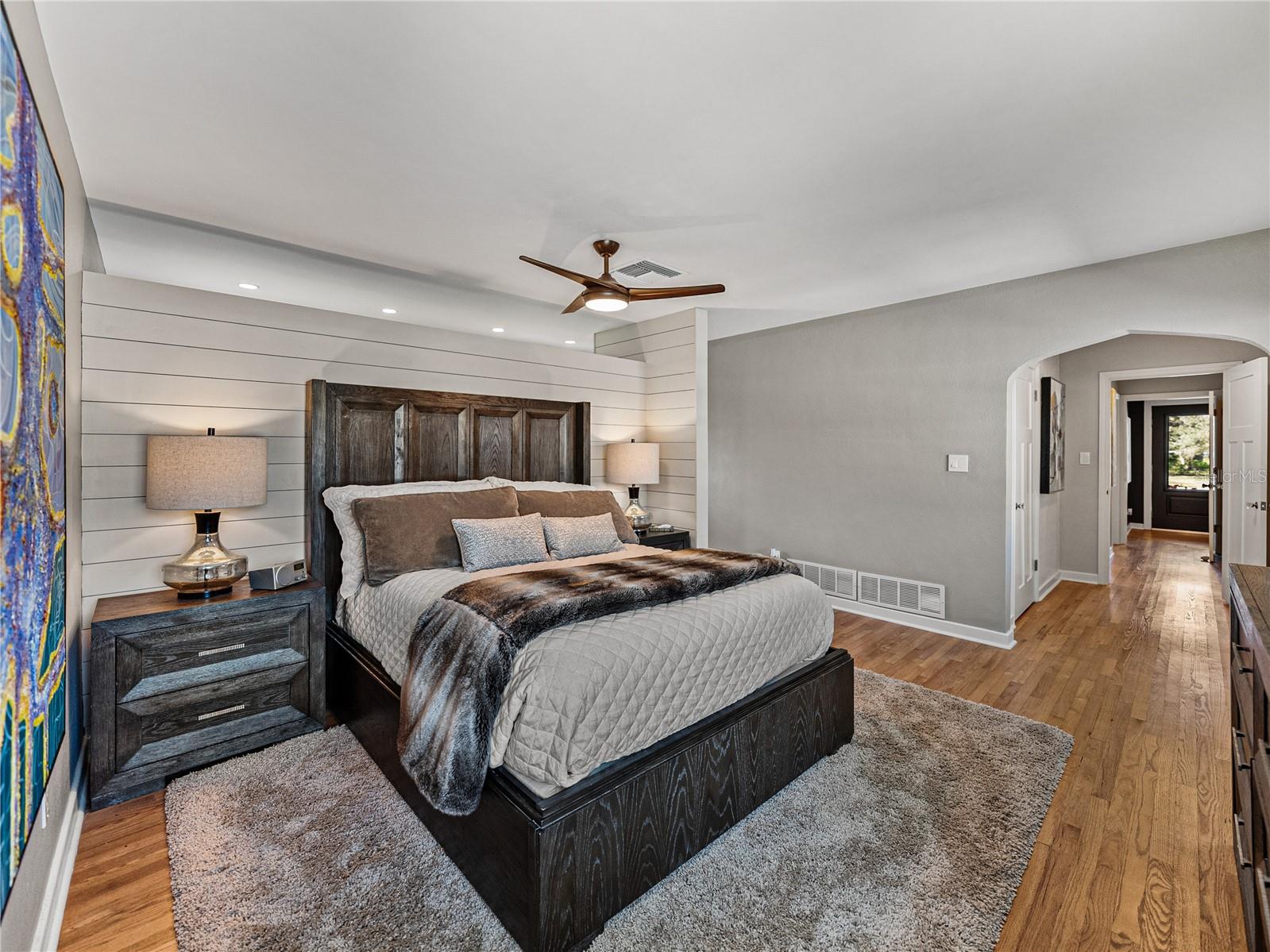 Shiplap custom wall in primary bedroom.