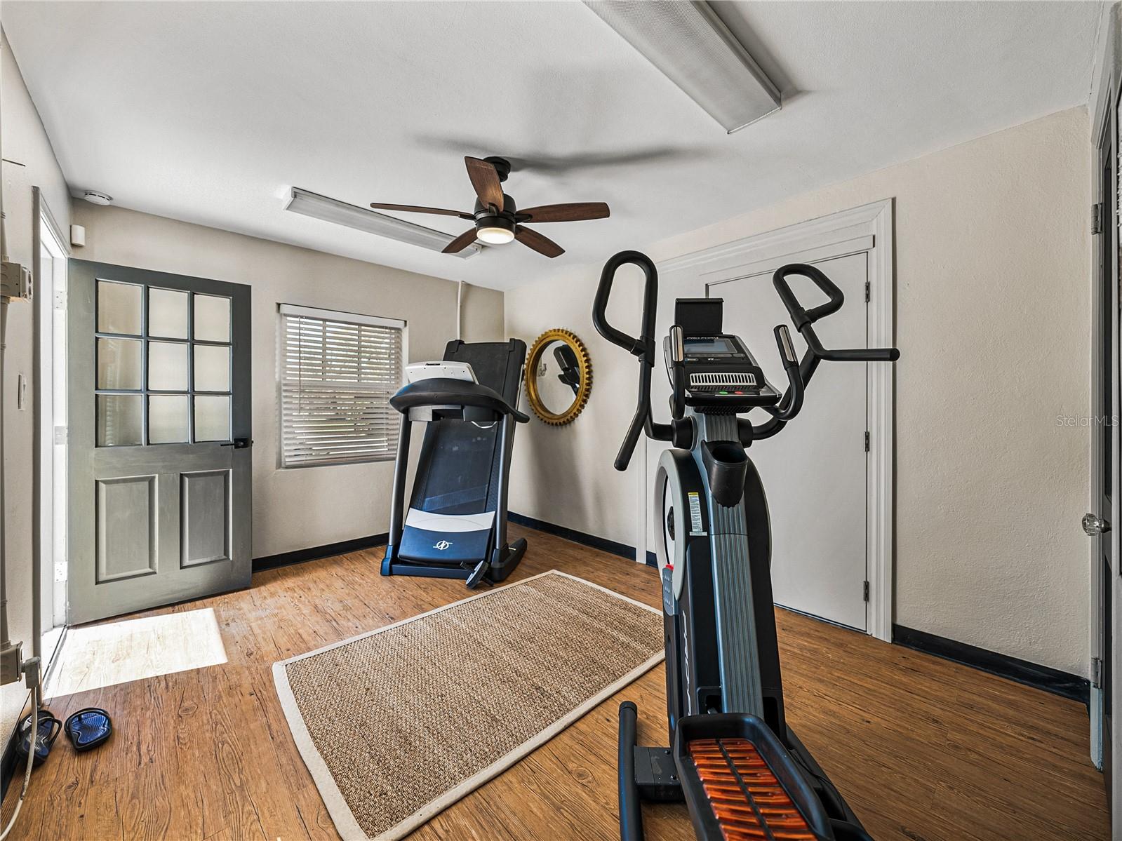 Mother-in-law suite, currently used as a gym - with SO MANY possibilities!