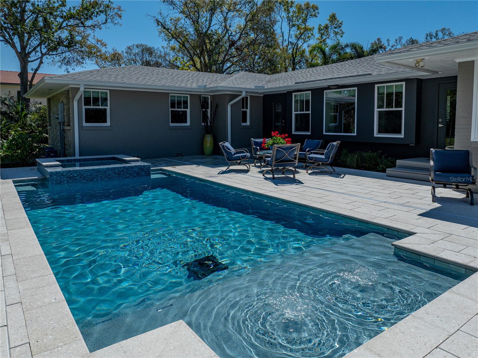 2024 salt water pool with sunshelf and bubblers.