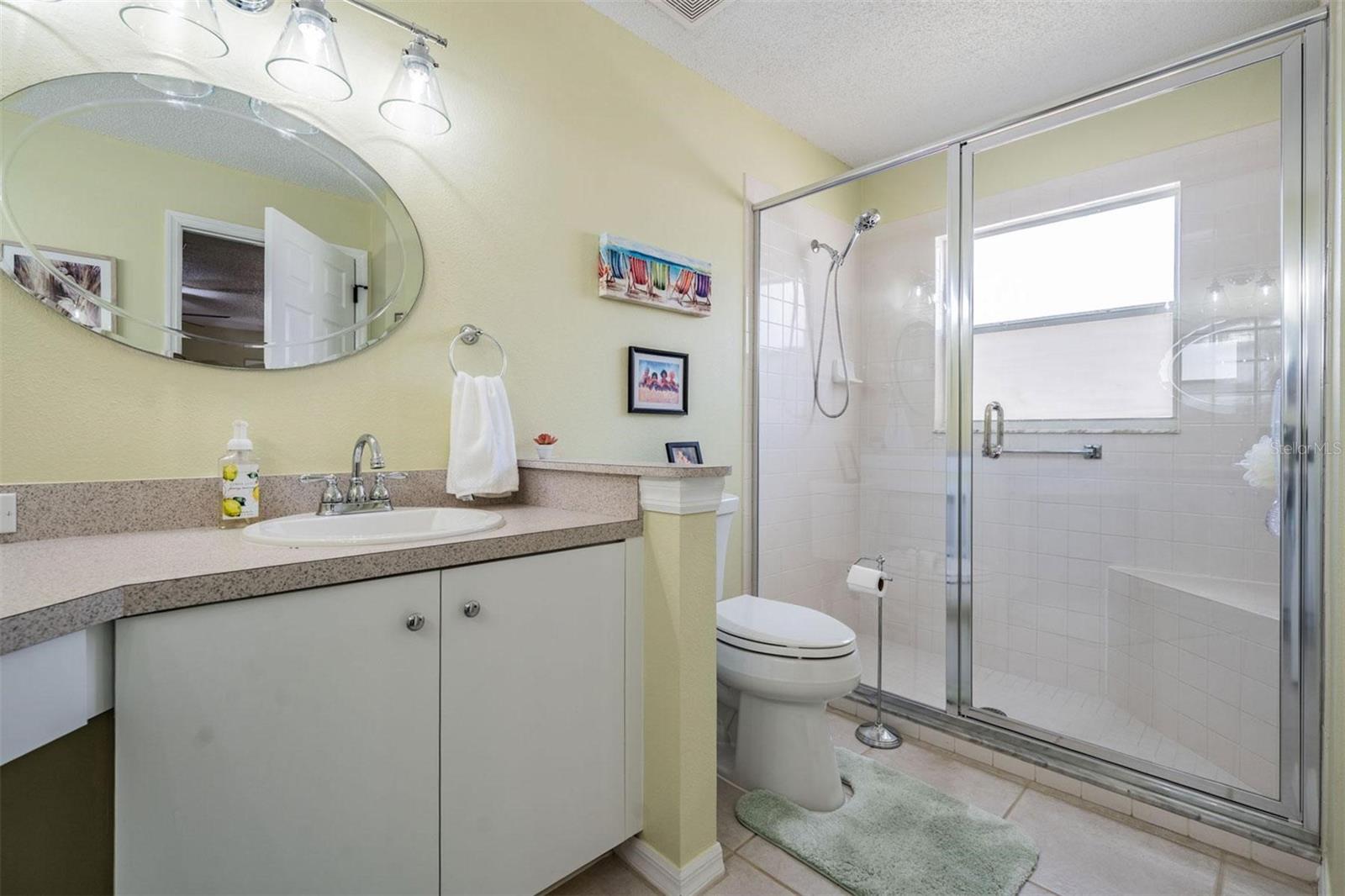 Built-in seating in the oversized shower