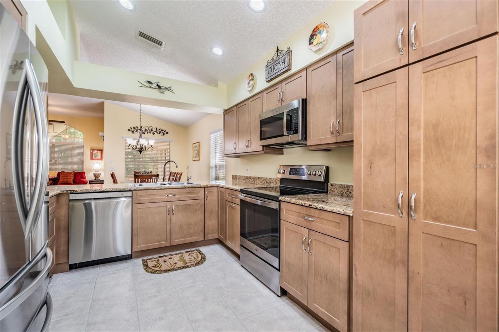 Updated stainless kitchen with more than ample cabinet space